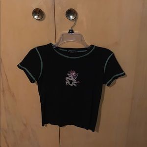A green stitch tee